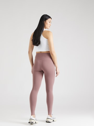 NIKE Skinny Sporthose 'UNIVERSA' in Lila