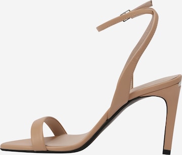 Calvin Klein - Sandalias con hebilla en beige