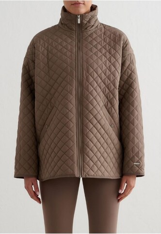 Aim'n Tussenjas in Bruin