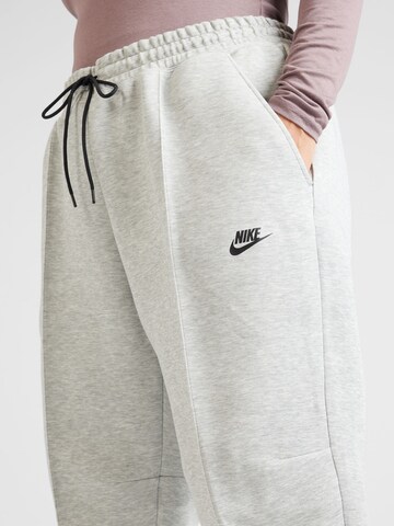 Nike SportswearTapered Sportske hlače - siva boja