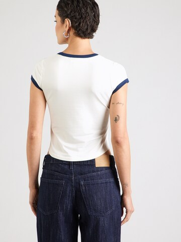 Tricou de la Calvin Klein Jeans pe bej: spate
