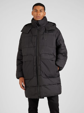 Manteau d’hiver Calvin Klein Jeans en noir : devant