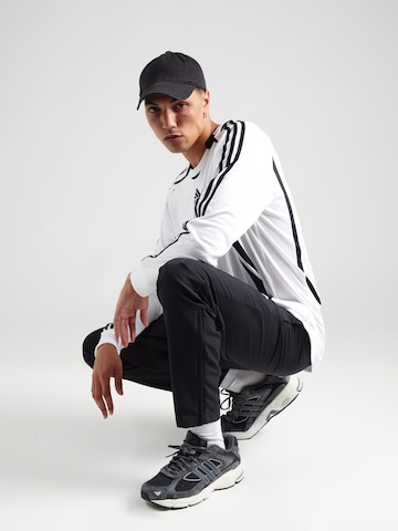 regular Pantaloni sportivi 'Entrada 22' di ADIDAS PERFORMANCE in nero