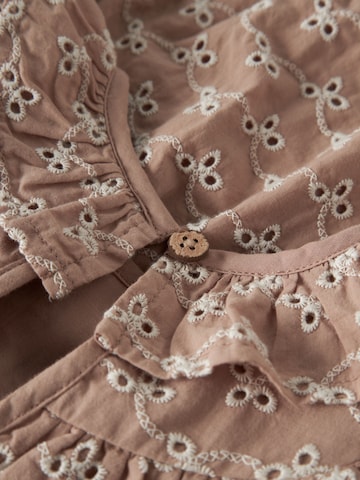 Tutina / body per bambino di Lil'Atelier in marrone