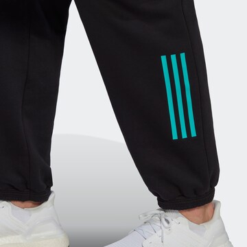 Loosefit Pantaloni sportivi di ADIDAS SPORTSWEAR in nero