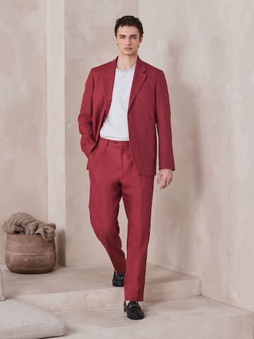 Loosefit Pantaloni con piega frontale di Next in rosso