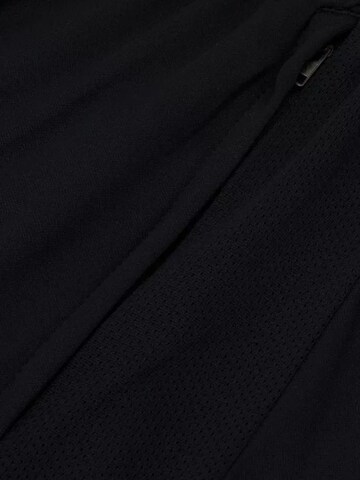 NIKE Regular Workout Pants in Black