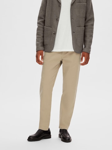 Coupe slim Pantalon chino SELECTED HOMME en beige : devant