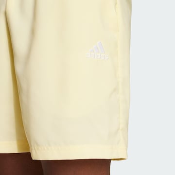 ADIDAS SPORTSWEAR Regular Workout Pants 'Essentials Chelsea' in Yellow
