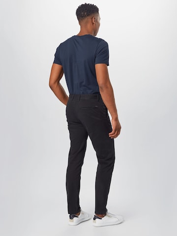 Slimfit Pantaloni eleganți 'Taber' de la BOSS Orange pe negru