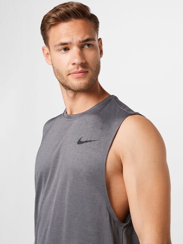 NIKE Performance shirt 'Superset' in Grey