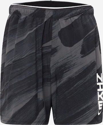 NIKE Regular Workout Pants in Black: front