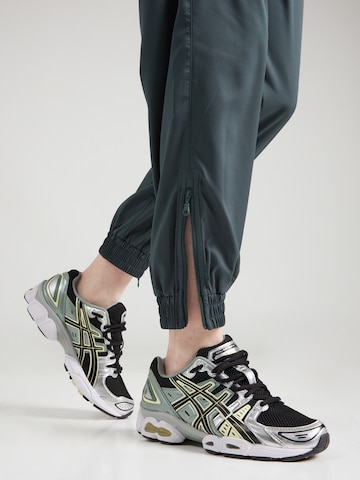 Girlfriend Collective Tapered Sports trousers 'Summit Track' in Green