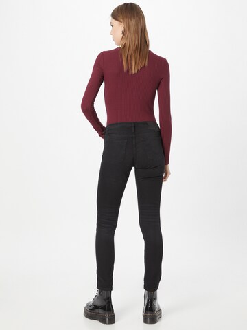 Skinny Jeans 'Cora' di True Religion in nero