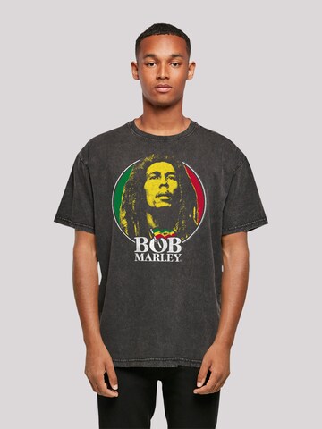 F4NT4STIC T-Shirt 'Bob Marley Logo Badge Reggae Music' in Schwarz: predná strana