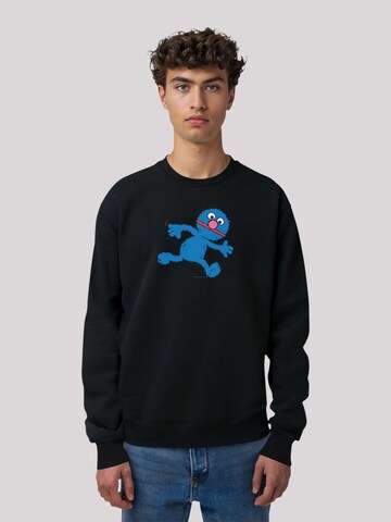 F4NT4STIC Sweatshirt 'Sesamstraße Grobie Running' in Zwart: voorkant