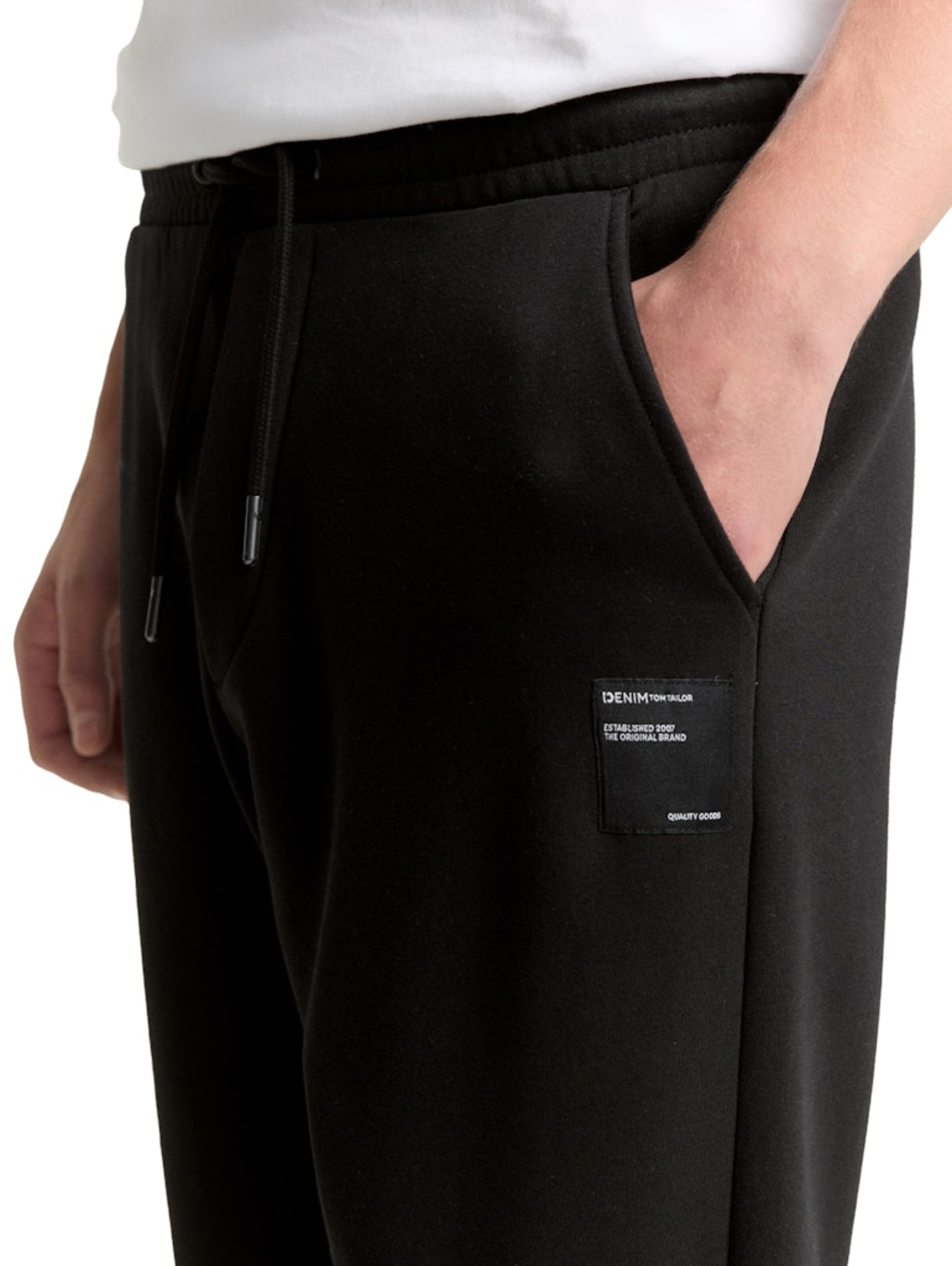 Tapered Pantaloni de la TOM TAILOR DENIM pe negru