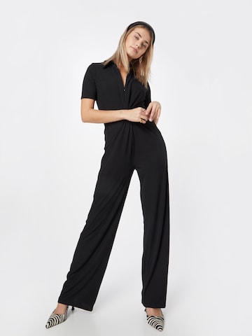 Tuta jumpsuit di Warehouse in nero