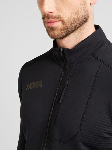 Hoka One One Sportpullover in Schwarz