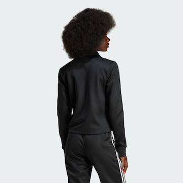 ADIDAS ORIGINALS Training Jacket in Black: front