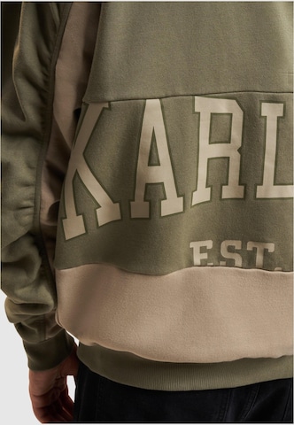 Karl Kani Zip-Up Hoodie in Green