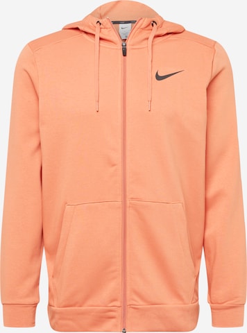 Veste de survêtement NIKE en orange : devant