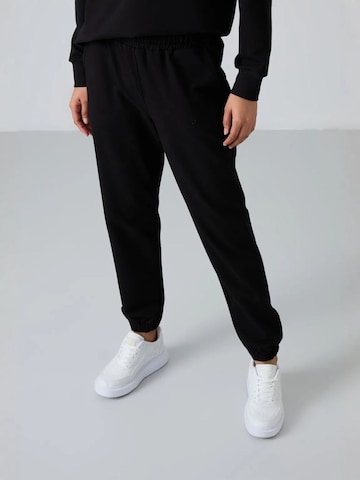 Tommy Life Jooksudress, värv must