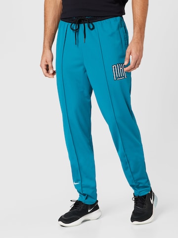 NIKE Tapered Sportbroek in Blauw: voorkant