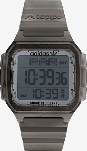 ADIDAS ORIGINALS - Reloj digital en gris: frente