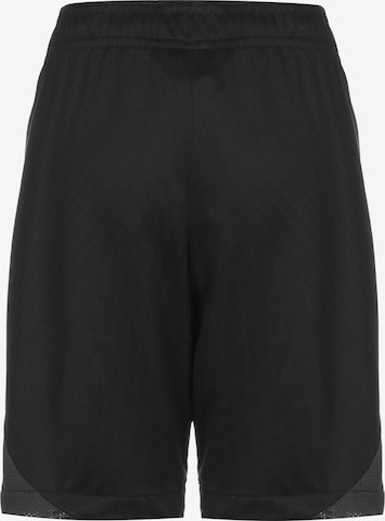 NIKE Loose fit Workout Pants in Black
