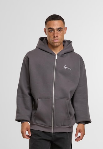 Veste de survêtement Karl Kani en gris : devant