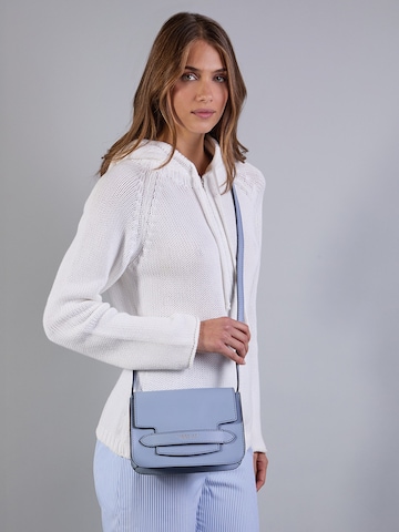 The Bridge Crossbody Bag in Blue: front