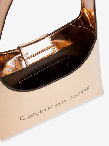 Calvin Klein Jeans Schoudertas in Goud