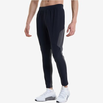 UNDER ARMOUR Regular Workout Pants 'Unstoppable Hybrid' in Black