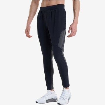 regular Pantaloni sportivi 'Unstoppable Hybrid' di UNDER ARMOUR in nero