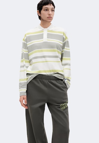 Champion - Pierna ancha Pantalón en verde: frente