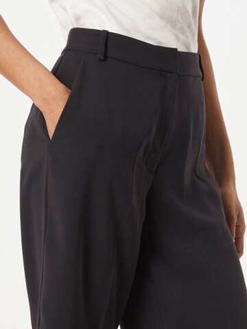 regular Pantaloni con piega frontale di Calvin Klein in nero