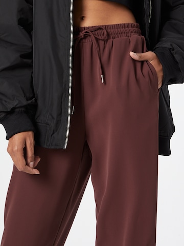 ABOUT YOU Loose fit Pants 'Romina' in Brown