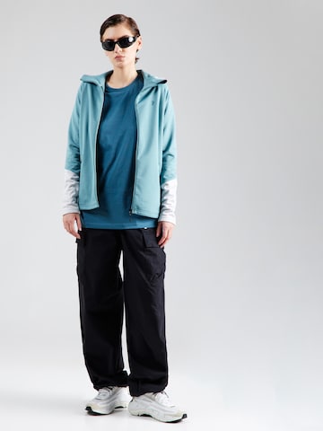 PEAK PERFORMANCE - Sudadera con cremallera deportiva 'Rider Essentials' en verde
