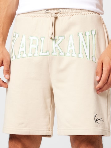 Regular Pantalon Karl Kani en beige