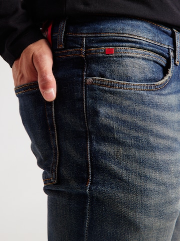 HUGO - Slimfit Vaquero '734' en azul