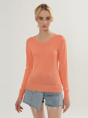 Pull-over Influencer en orange : devant