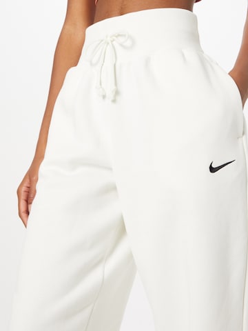 Nike Sportswear Широка кройка Панталон в бежово