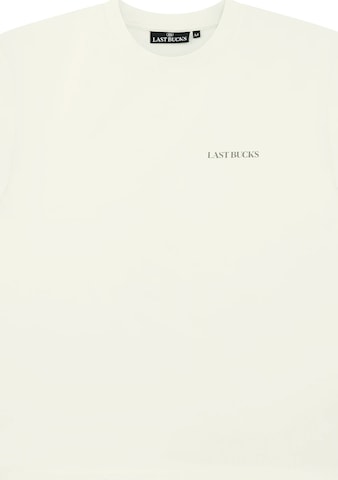 Maglietta 'Last Bucks | Uncaged Birds' di Last Bucks in bianco: frontale