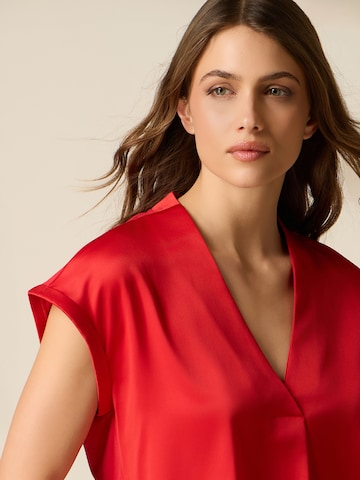 Maglietta di oltre in rosso