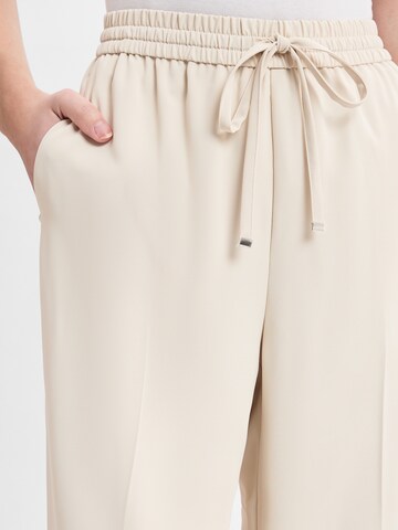 Someday Wide leg Trousers with creases 'Cevil' in Beige