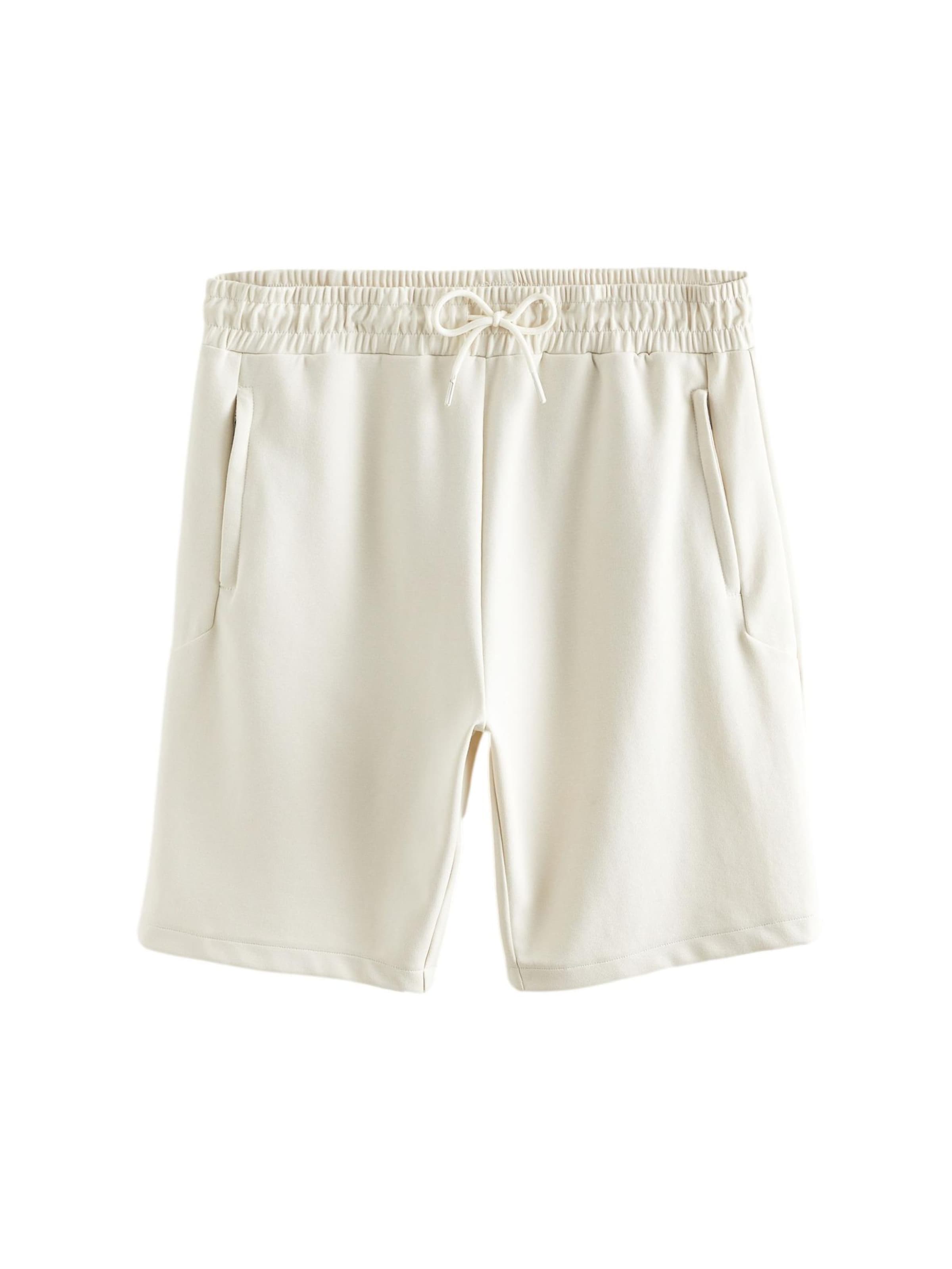 Next Штаны в Бежевый: спереди