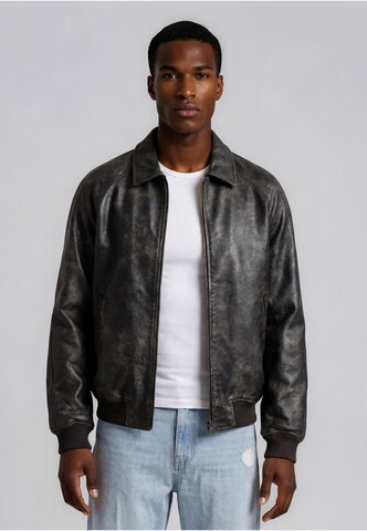 Karl Kani Between-Season Jacket in Black: front