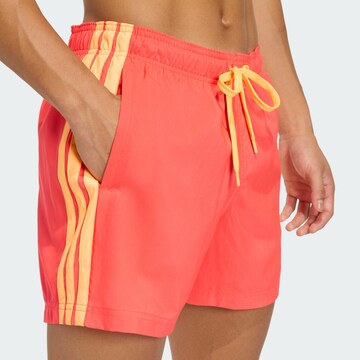 ADIDAS SPORTSWEAR Sportbadeshorts '3 STRIPES SWIM SHORTS 5' in Rot