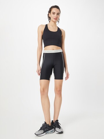 UNDER ARMOUR Skinny Sports trousers in Black